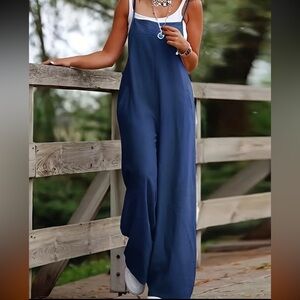 NWOT! BRAND NEW! Navy Blue Spaghetti Strap bell bottom jumpsuit